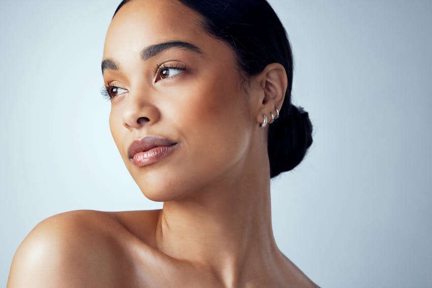 woman with hair in a low bun