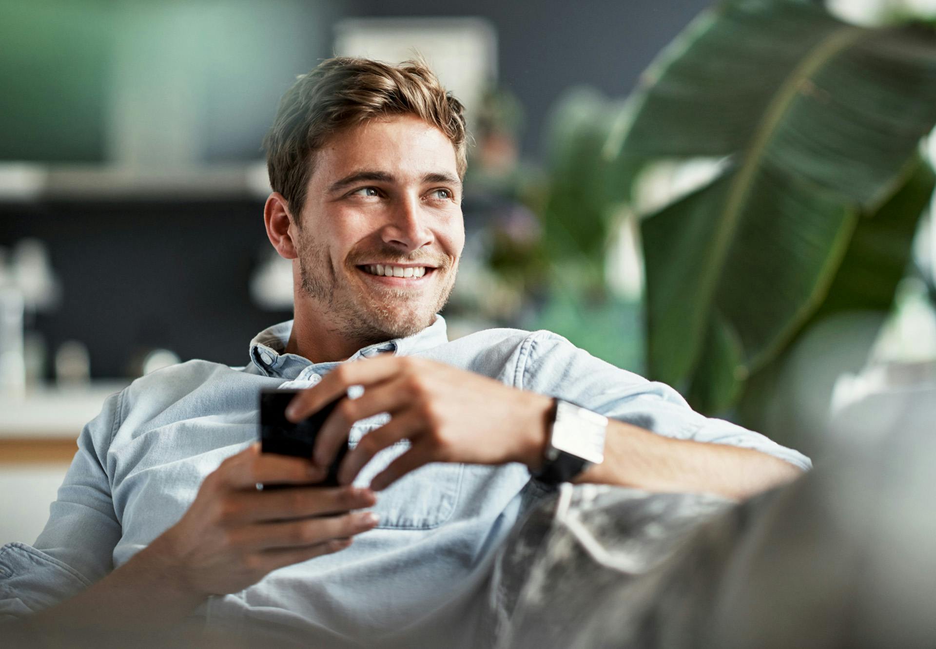 sitting on couch and texting