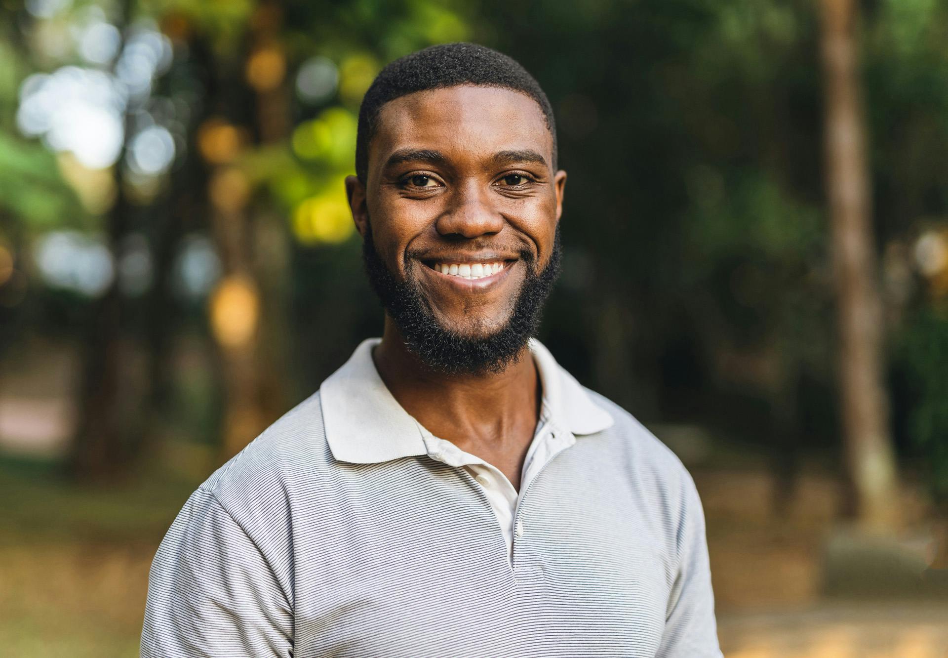 smiling in polo
