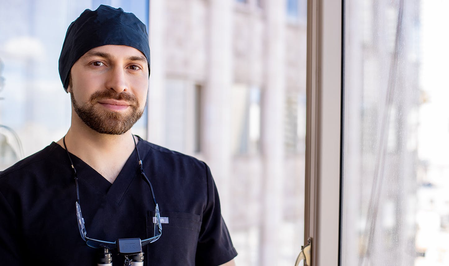 doctor next to window