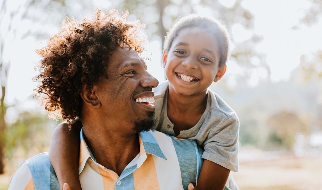child playing with father