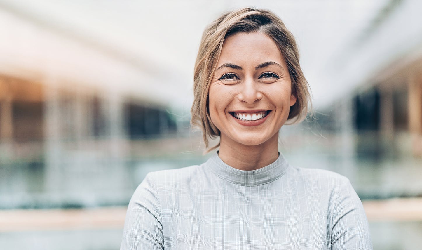 smiling with blurred background