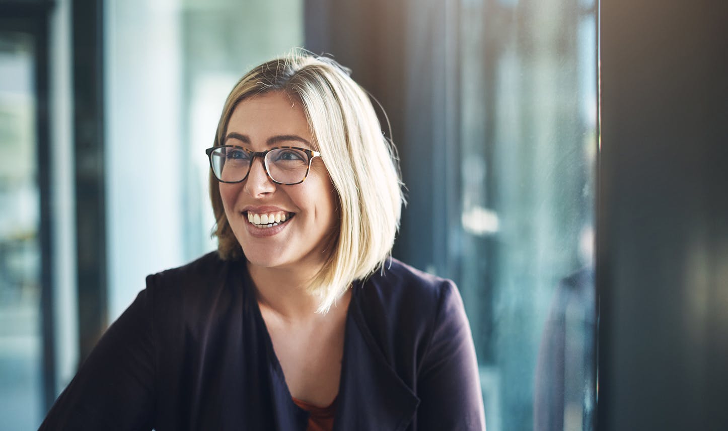 smiling in glasses