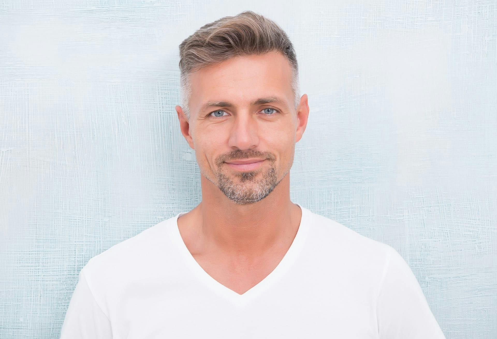 man looking at camera smiling