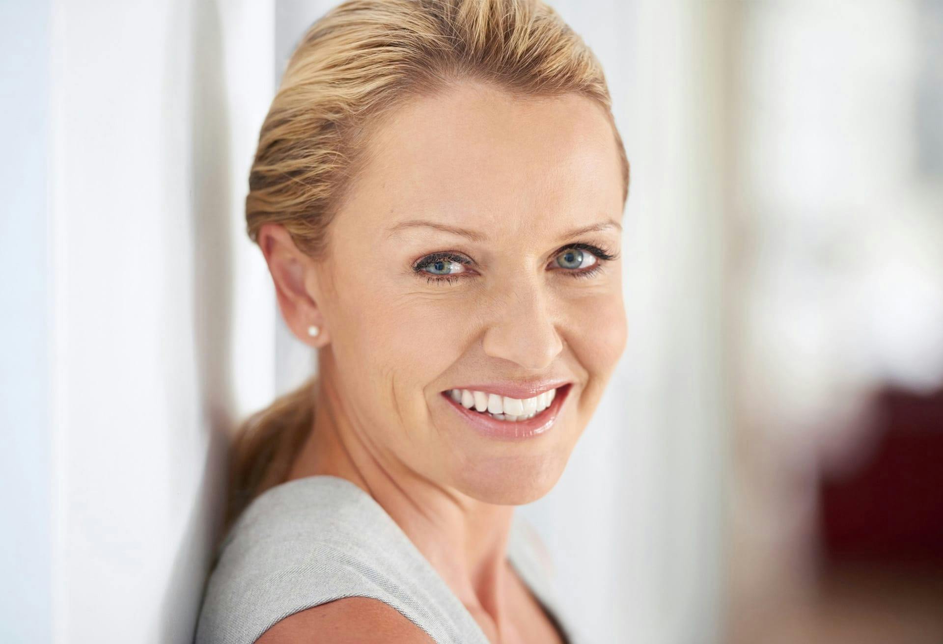 woman smiling in camera