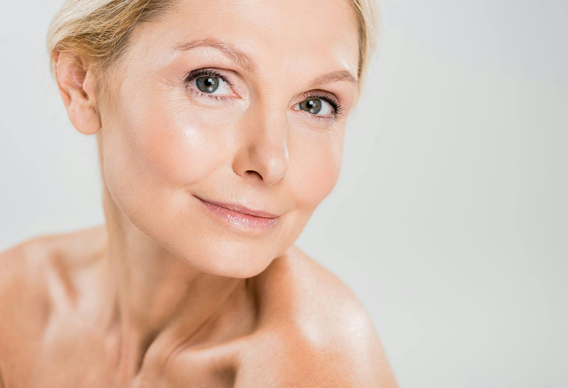 close up of older woman looking into camera
