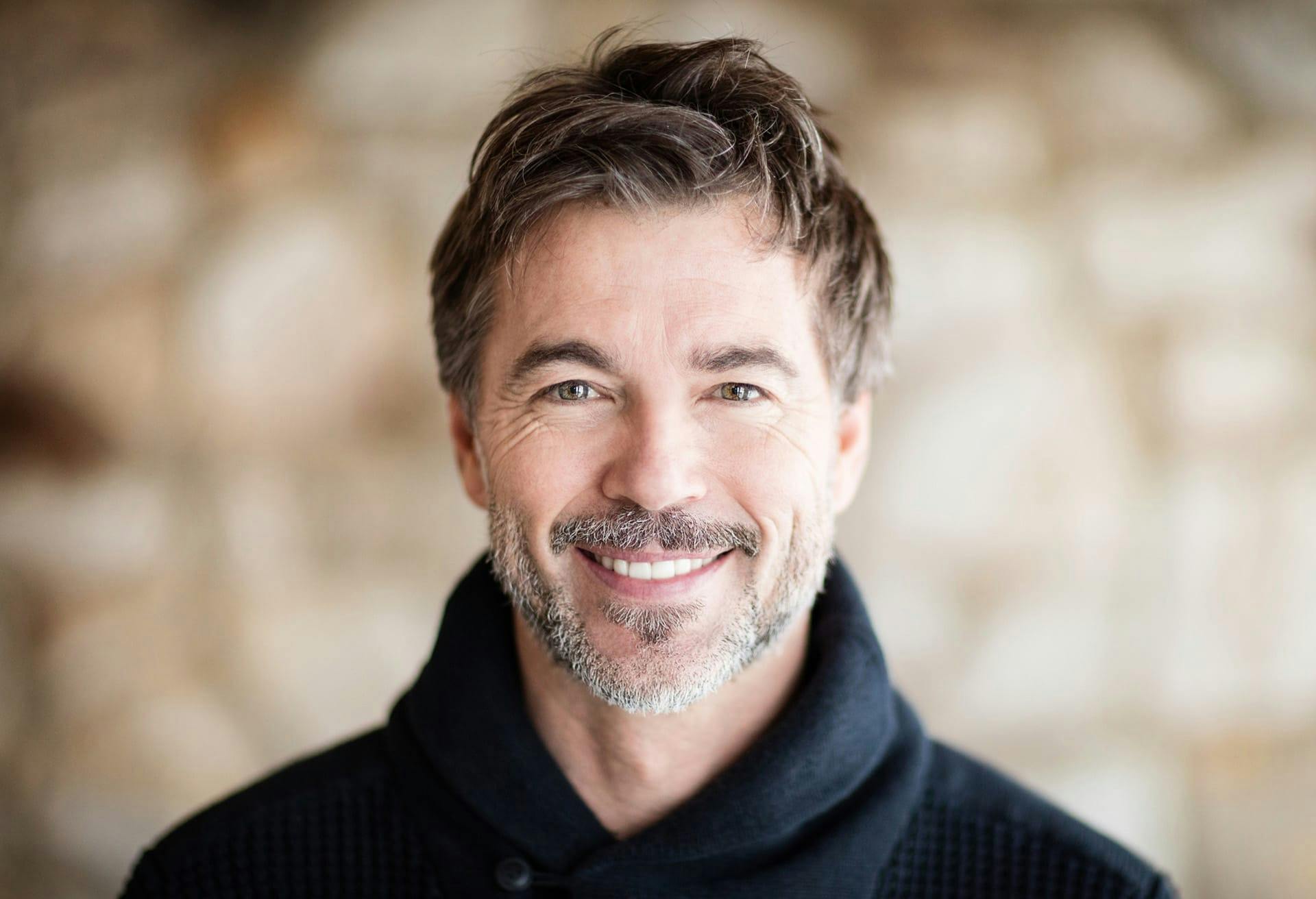 man smiling into camera