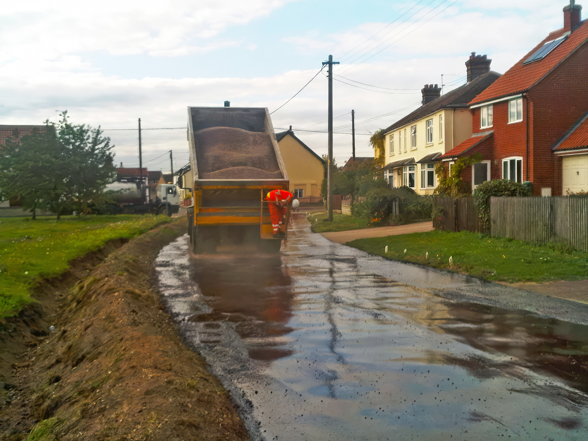 neighborhood, truck, vehicle, outdoors, shelter, ditch, water, person, housing, roof