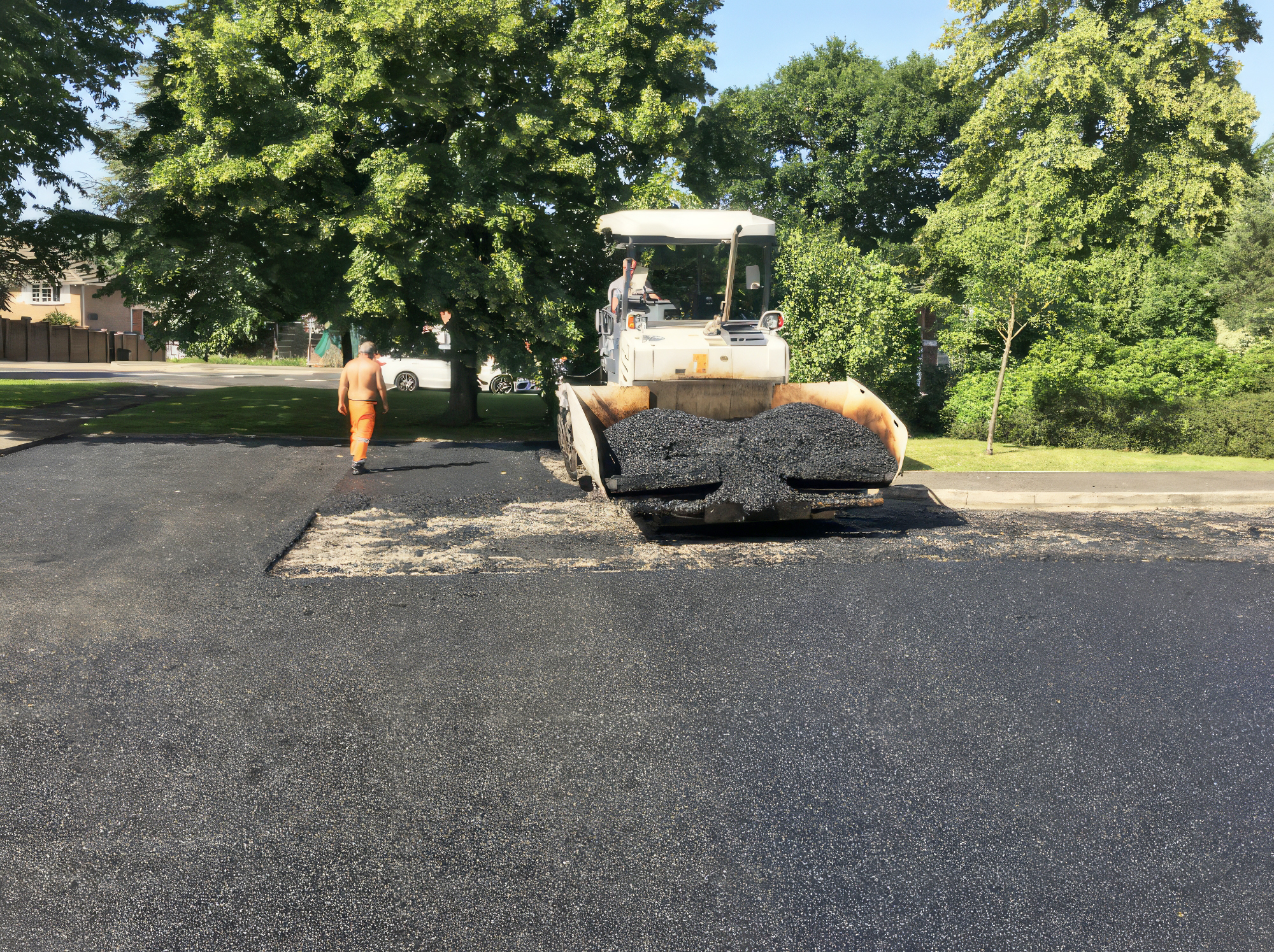 road, tarmac, person, car, vehicle, clothing, footwear, shoe, glove, handbag