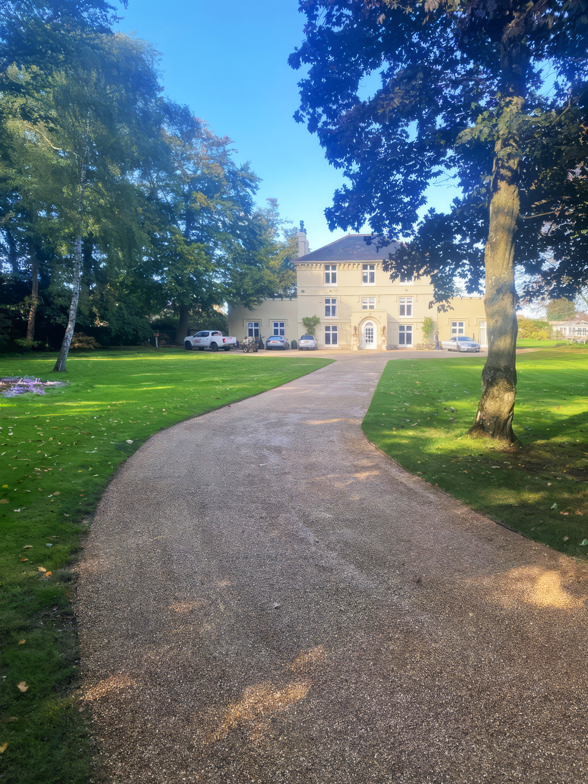 housing, pickup truck, outdoors, house, car, driveway, person, aerial view, bicycle, grass