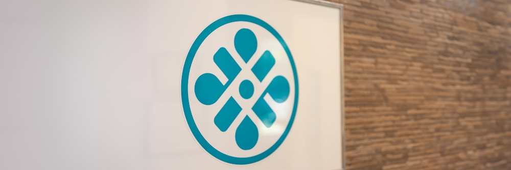 staff in front of office