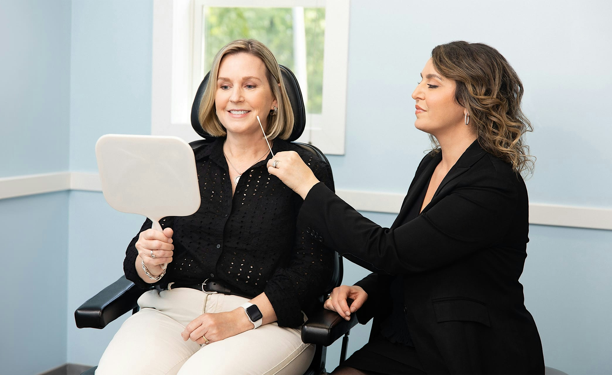 side profile of smiling woman