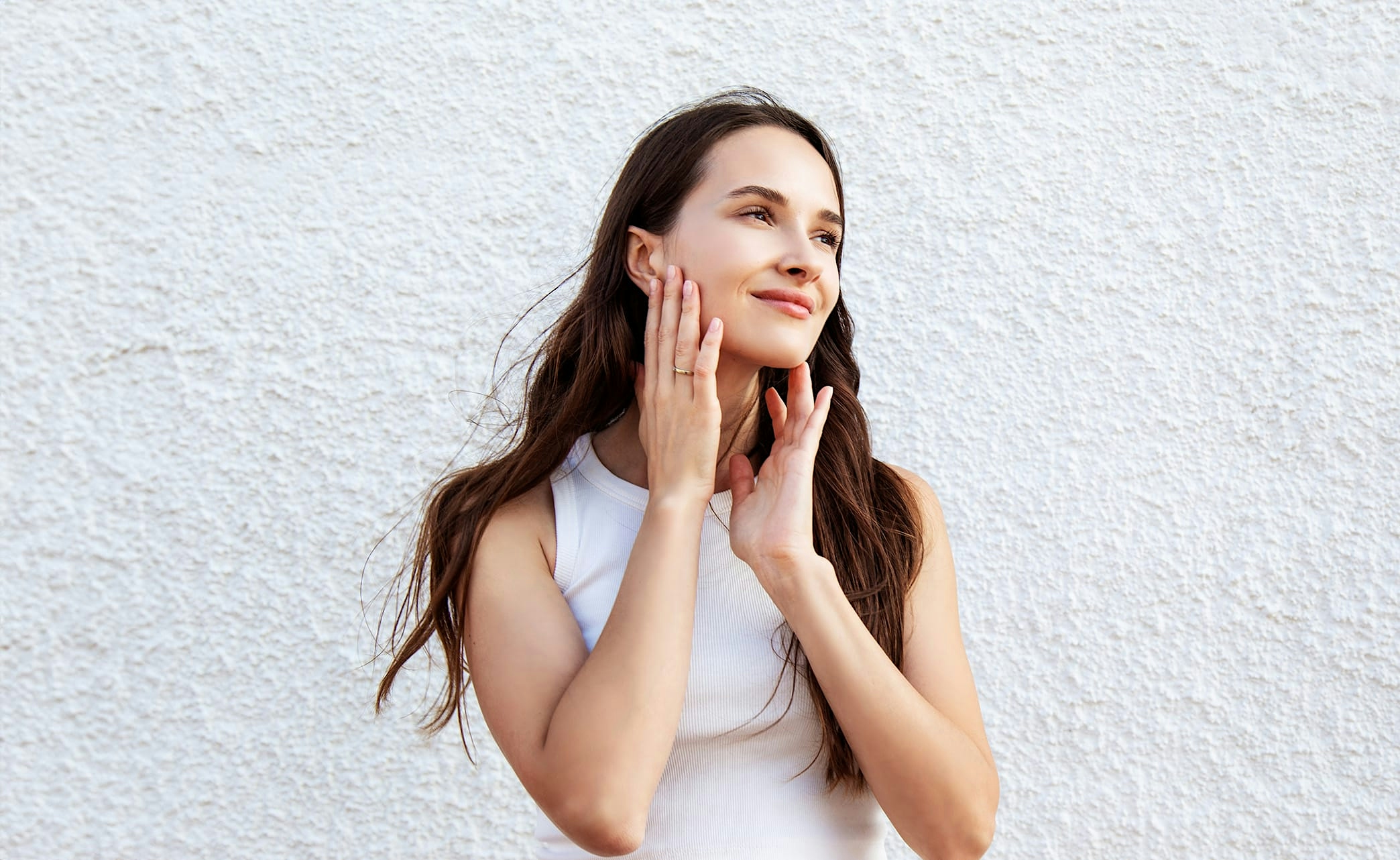 woman in green bra sitting near coffee table