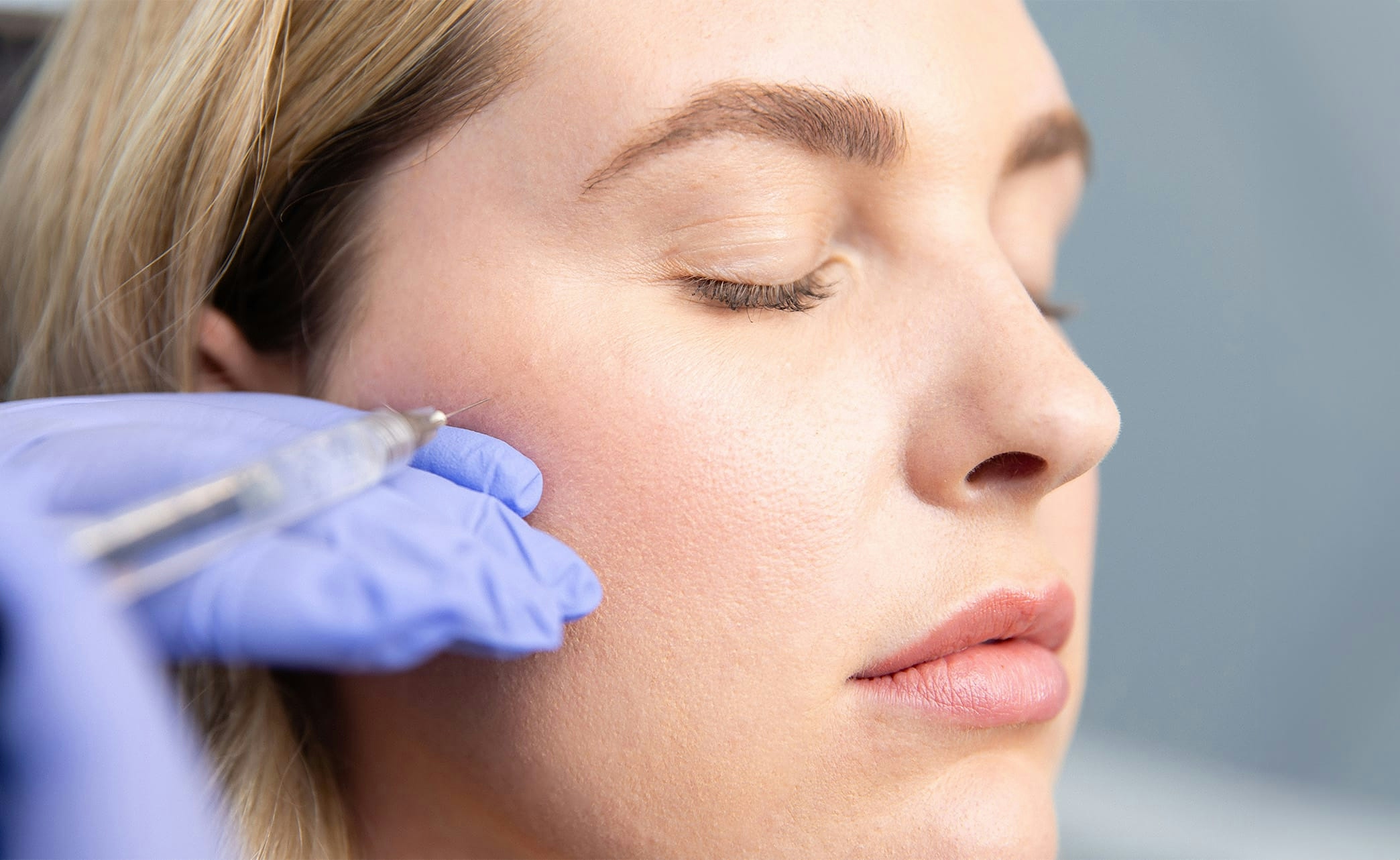 woman in pink blouse