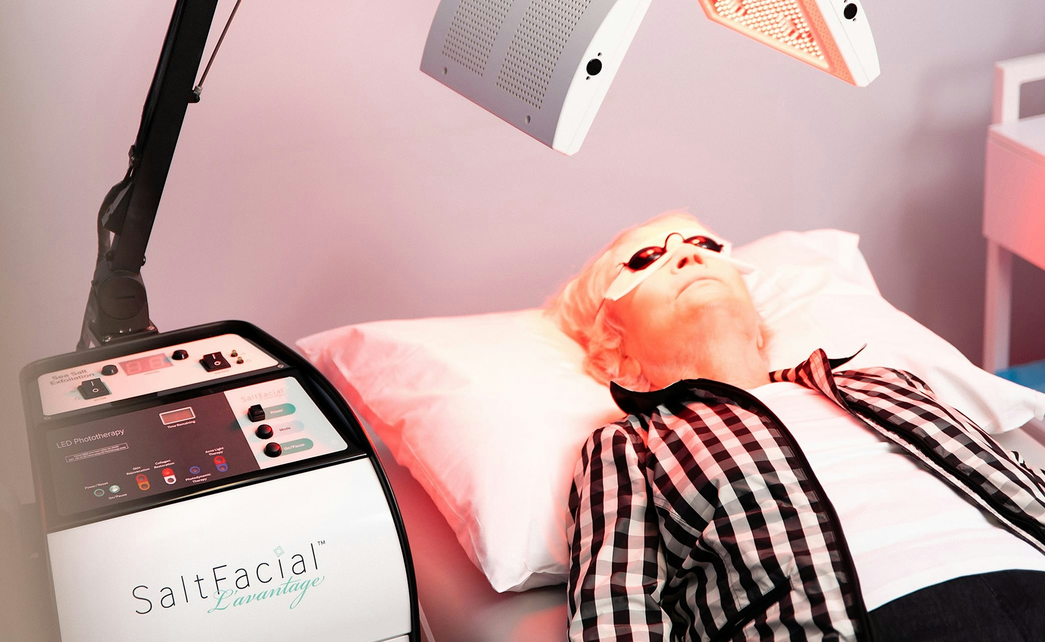 smiling woman with hands enshrining face