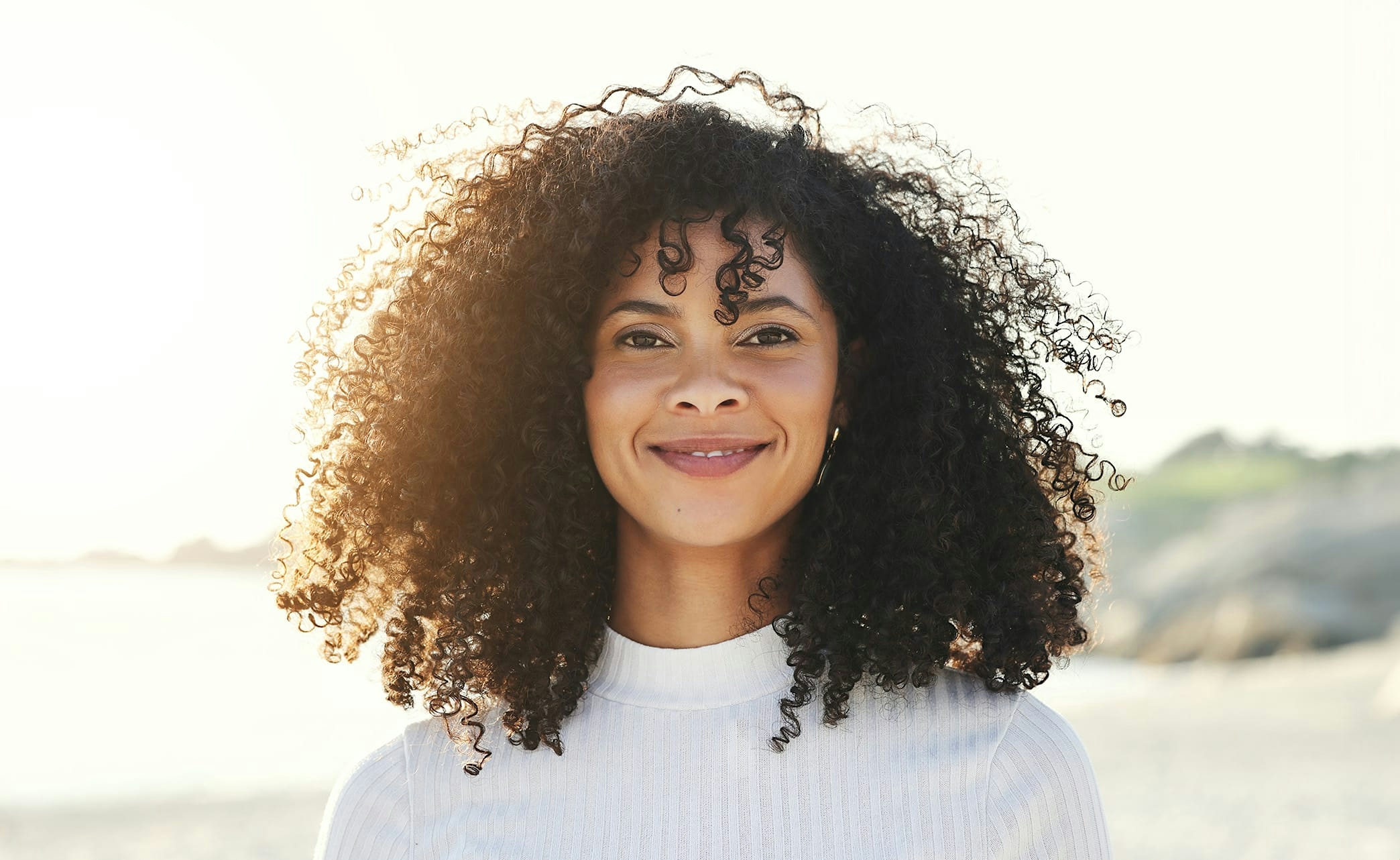 doctor applying treatment to face