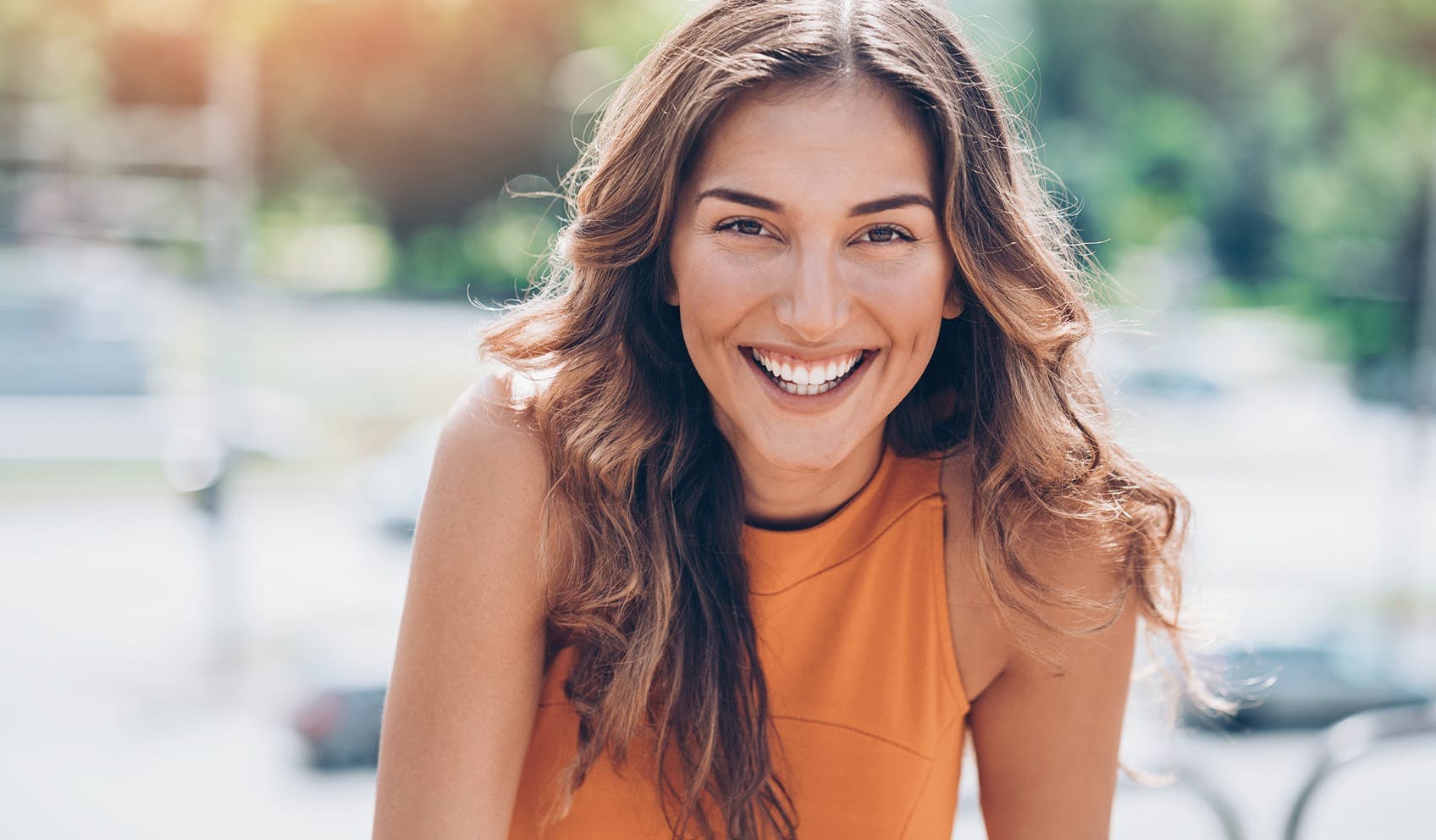 beautiful woman smiling and enjoying outside