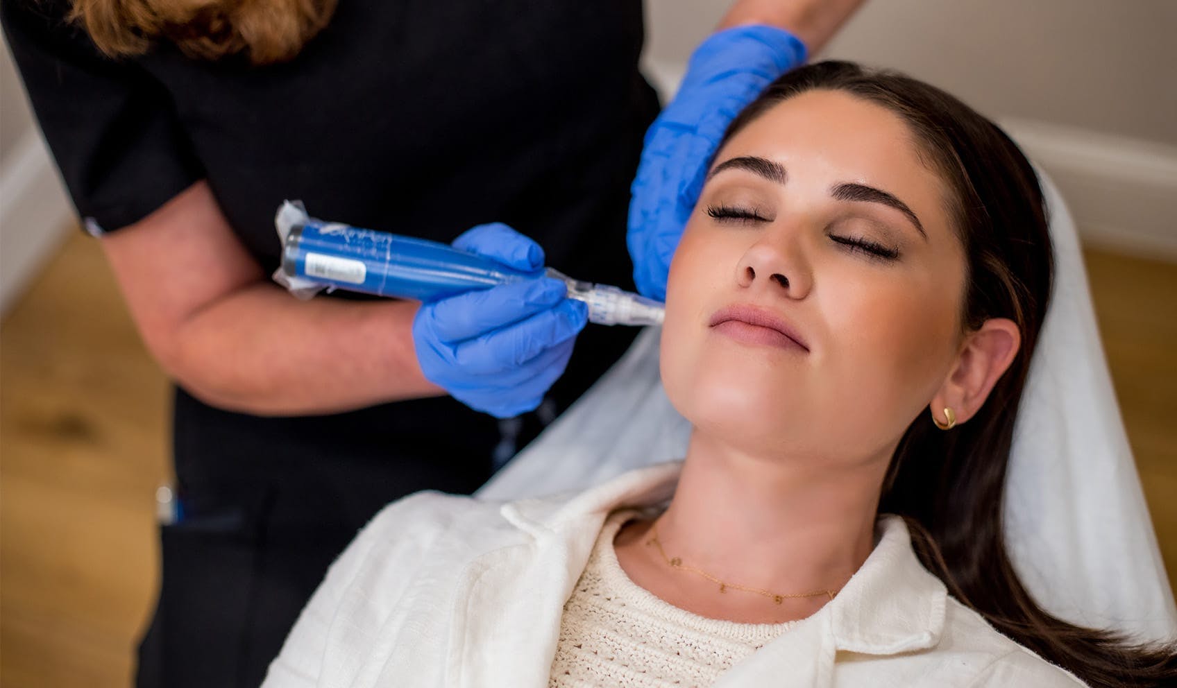 woman receiving Microdermabrasion