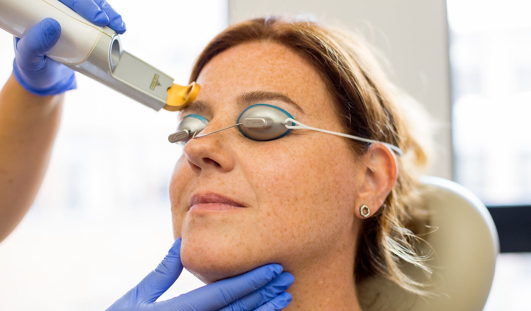 Woman receiving laser treatment