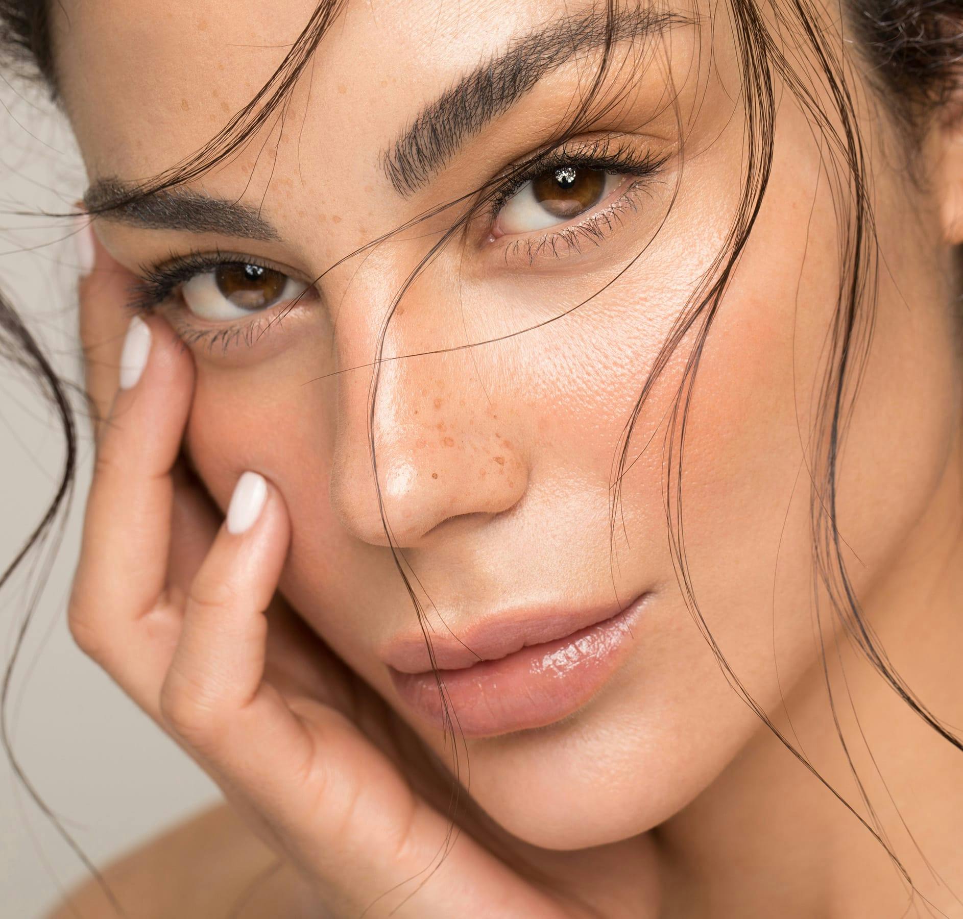 hand on cheek close-up