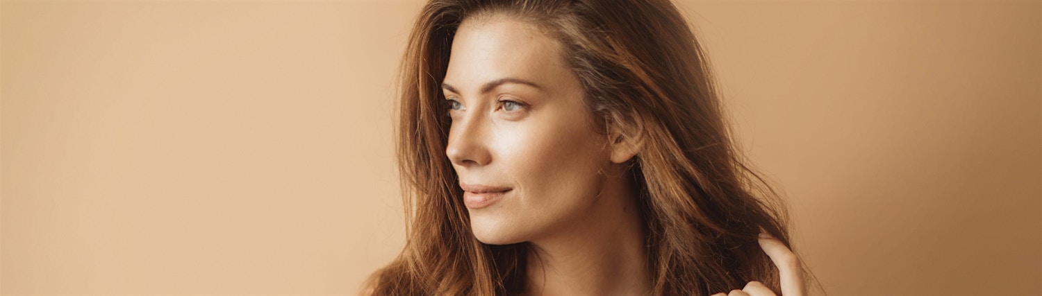 brunette woman looking to side