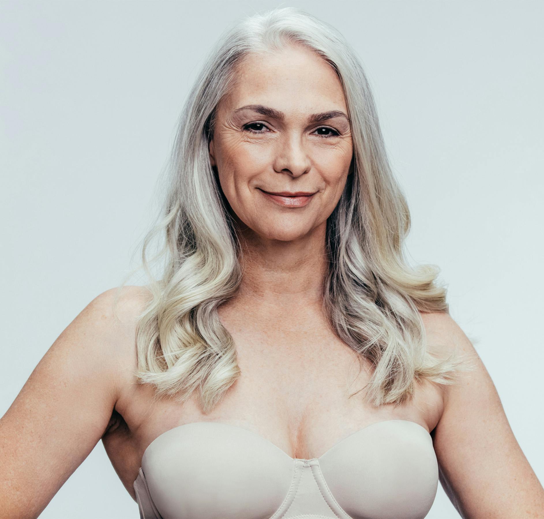 smiling in strapless bra