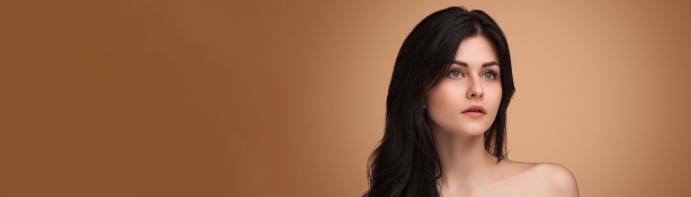 looking away dark orange background