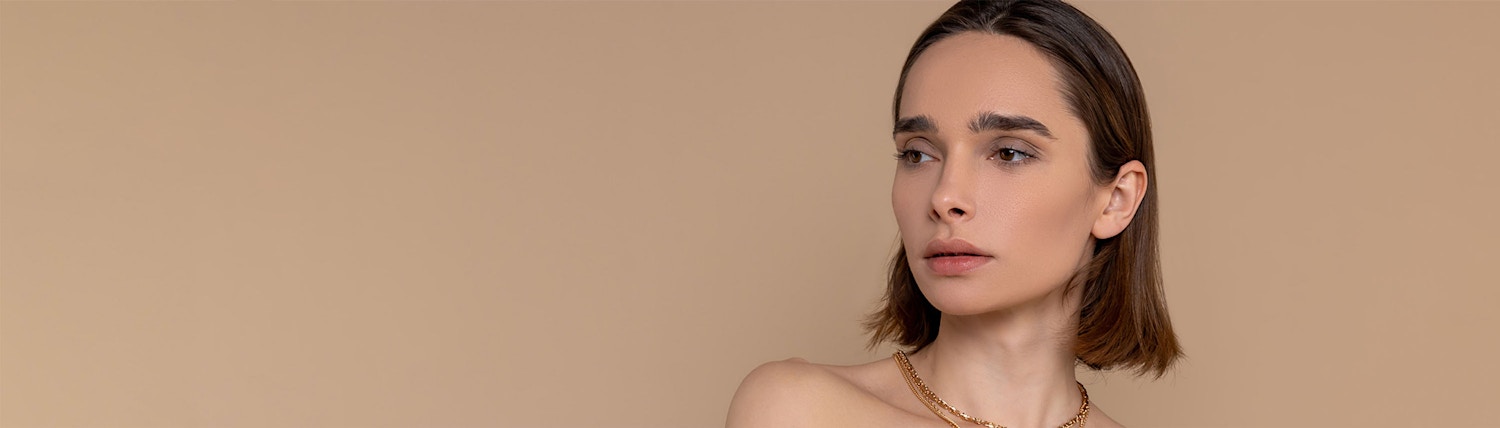 looking to side creme orange color background