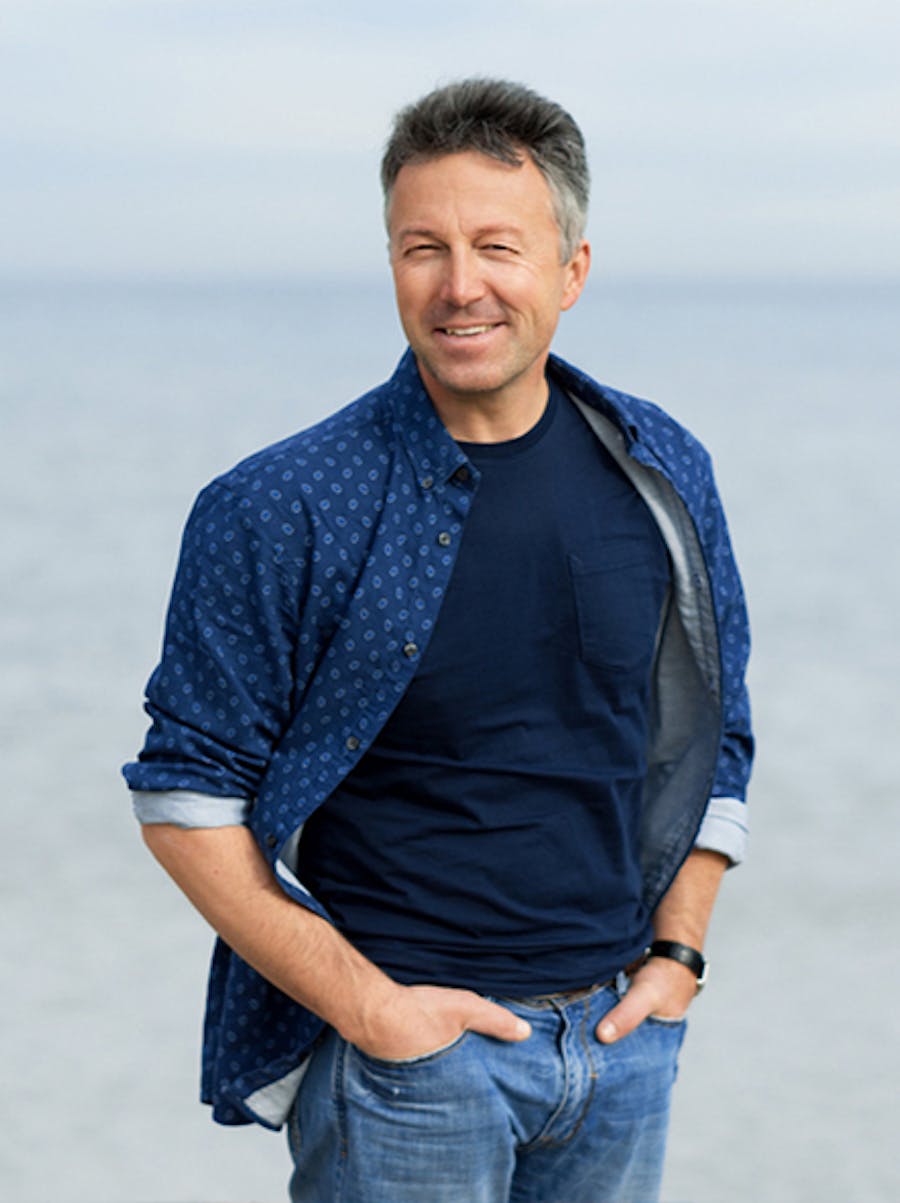 hands in pockets at beach