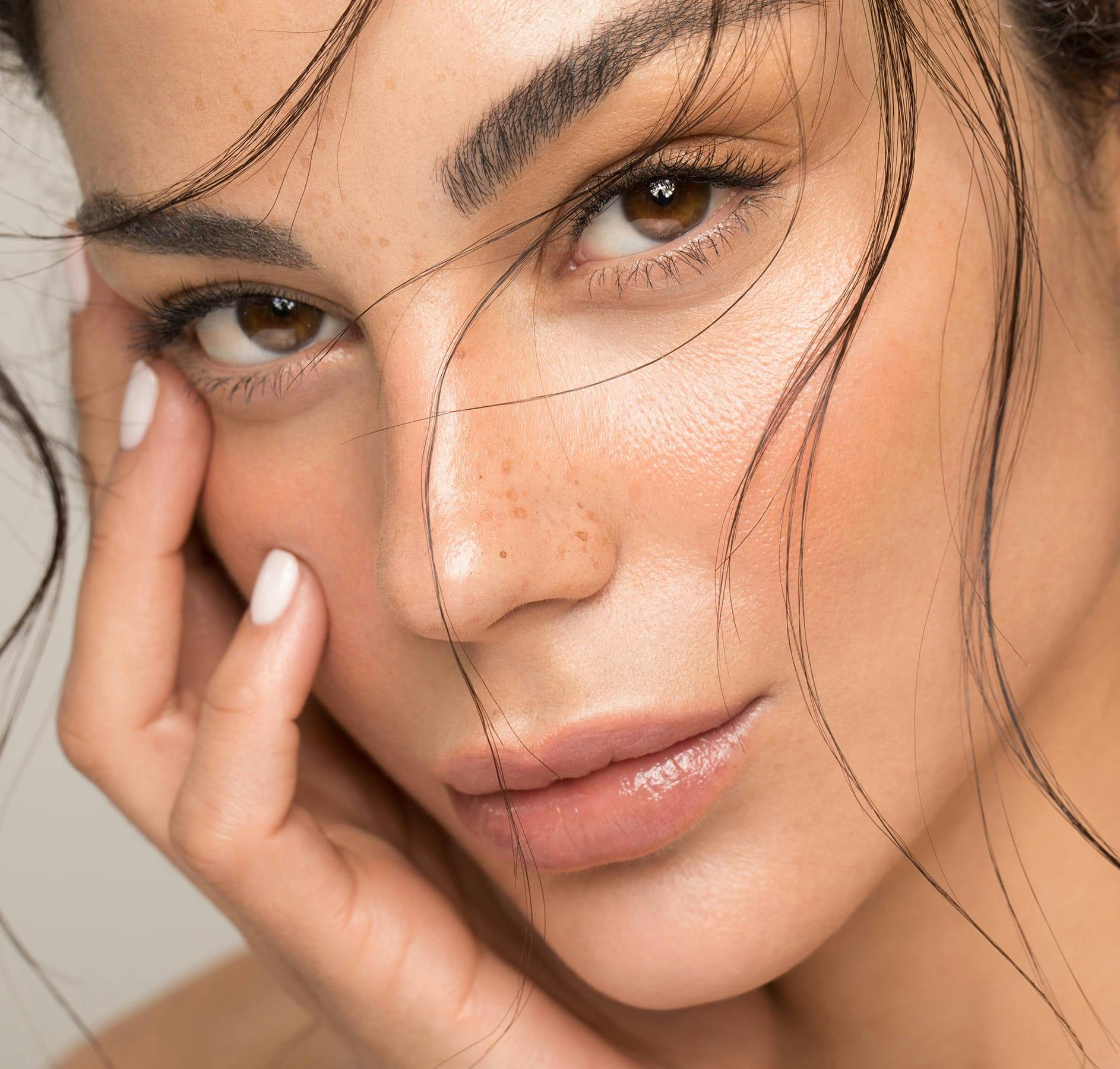 woman with freckles on her nose