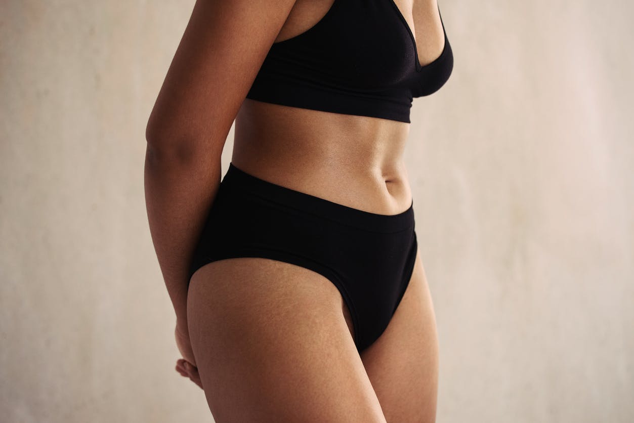female body wearing black underwear.