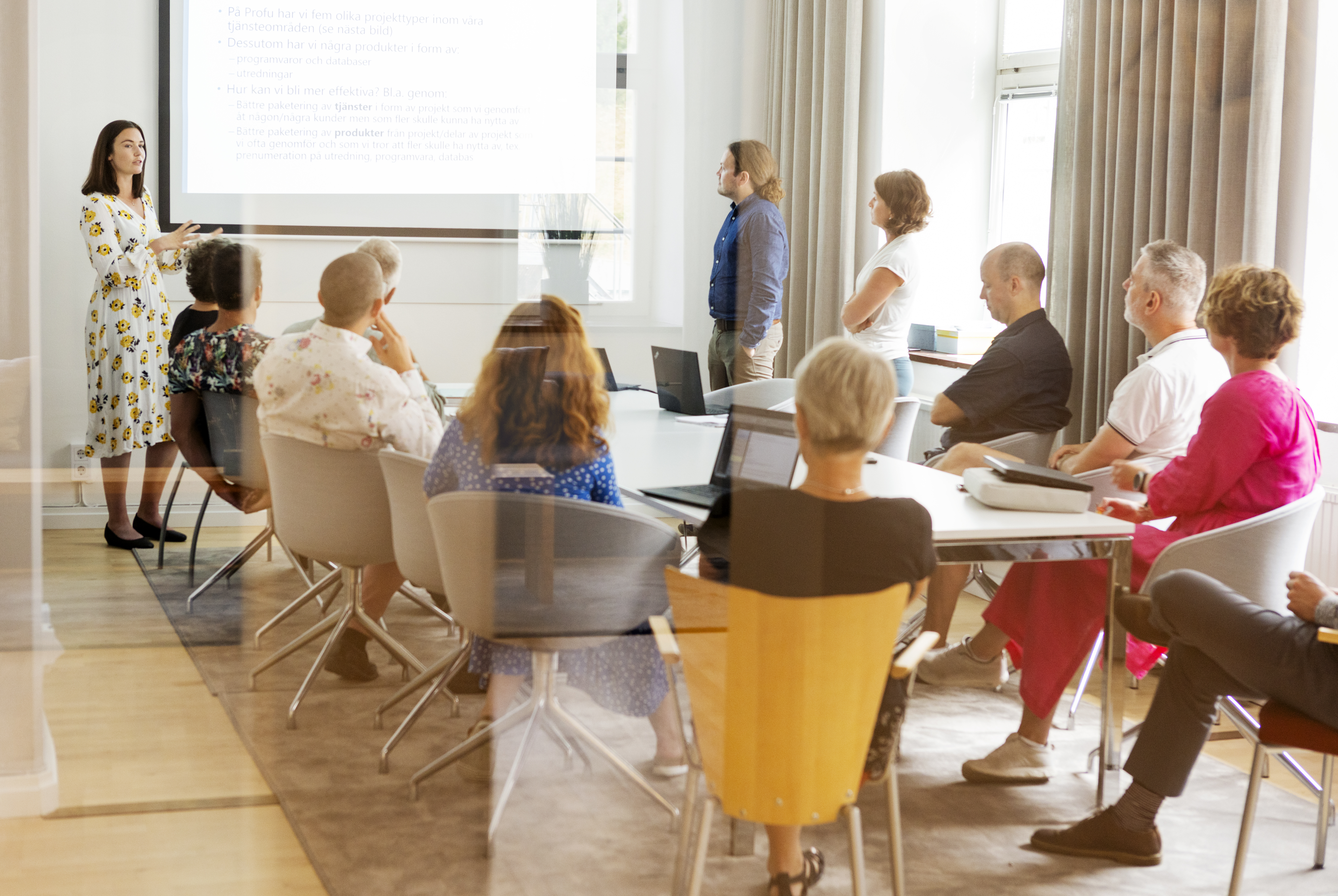 Image of meeting at Profu's office.