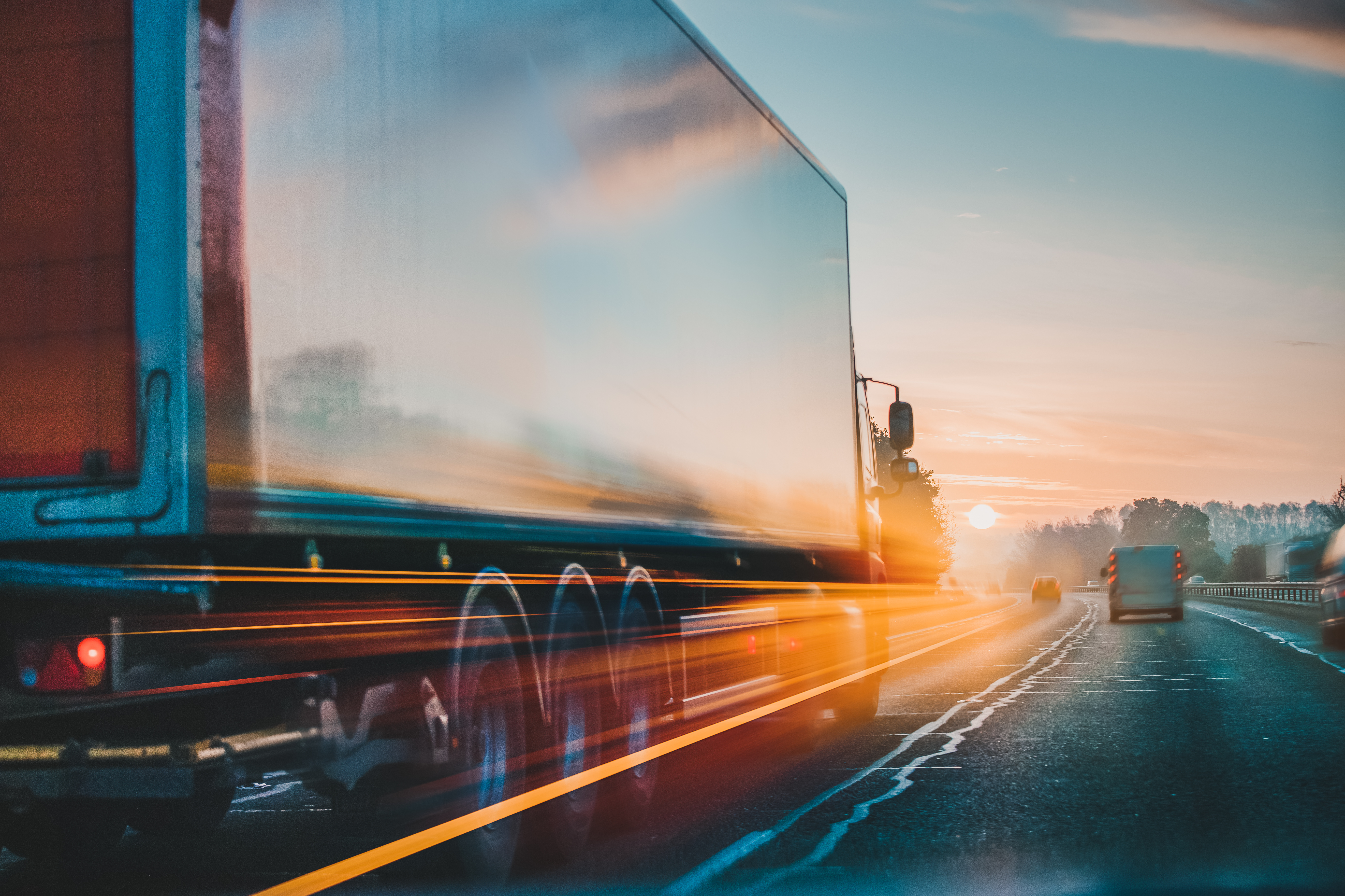 Truck moving fast on a large road