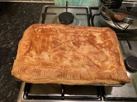 Chicken and bacon pie with a golden crust