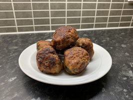 A plate of fried meatballs