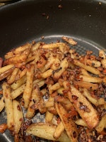 Salt & pepper chips in a wok