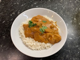 A bowl of butter chicken