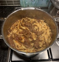 A pot pasta and beef ragu