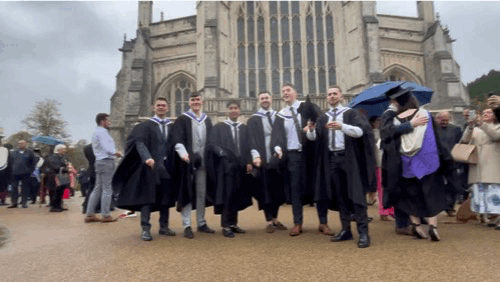Throwing our graduation caps outside the winchester cathedral