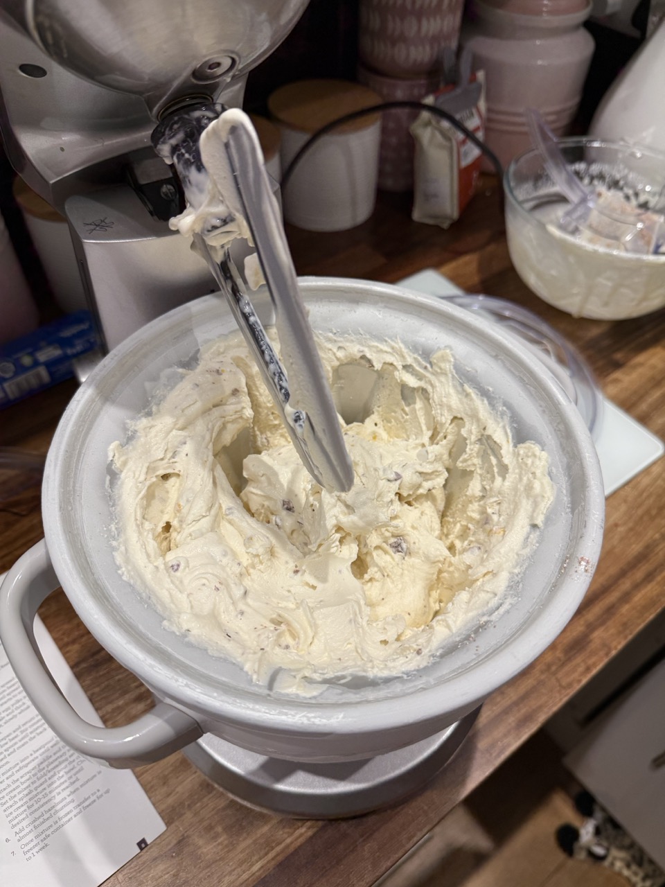 Vanilla ice cream being mixed in the stand mixer freezer bowl