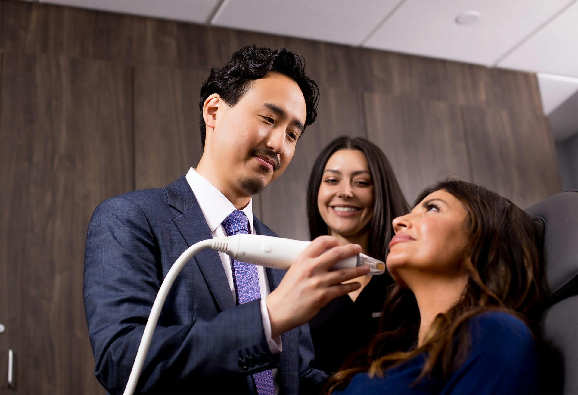 Dr. Lee with a patient