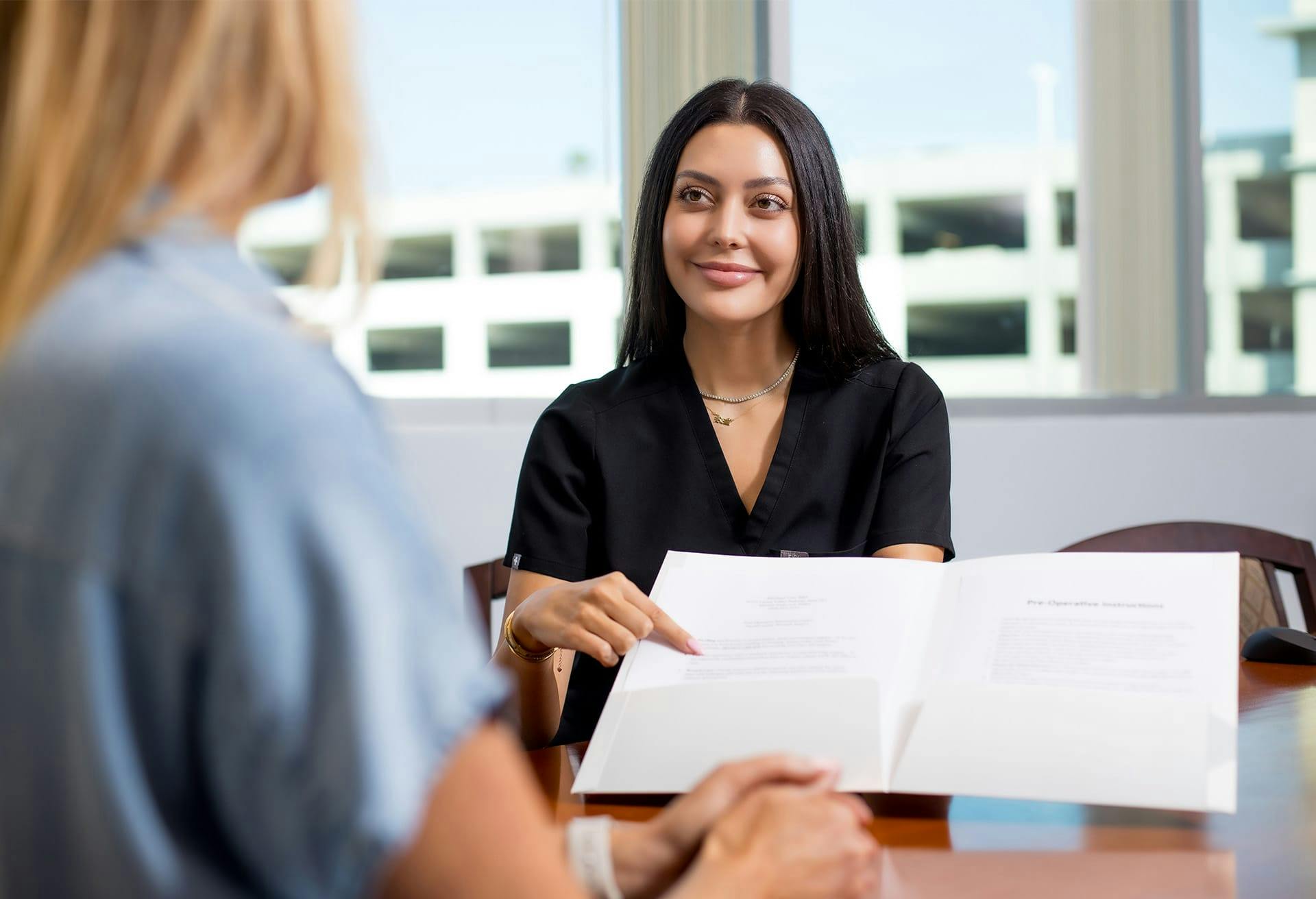 Nurse going over paperwork