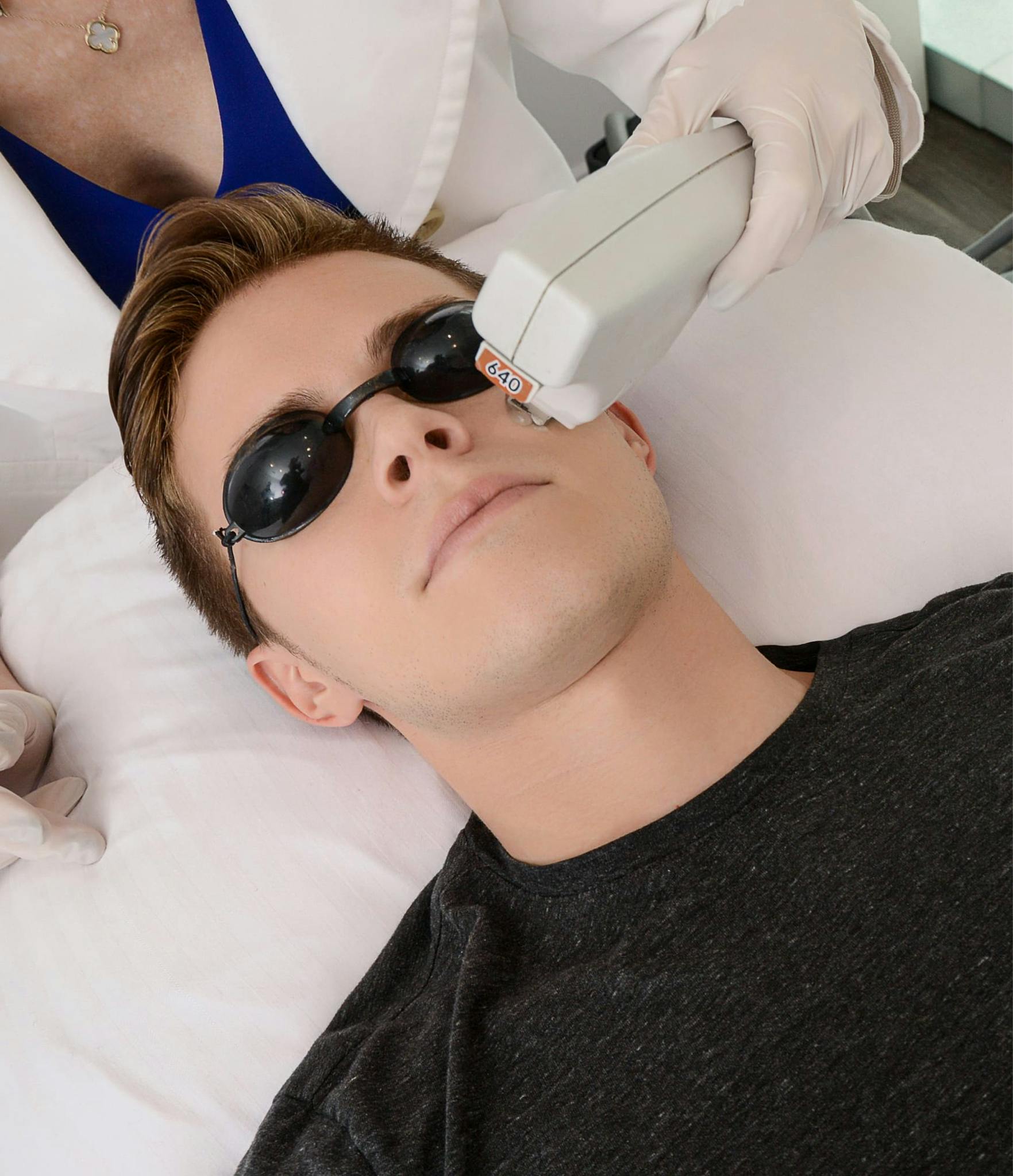 Man receiving laser treatments