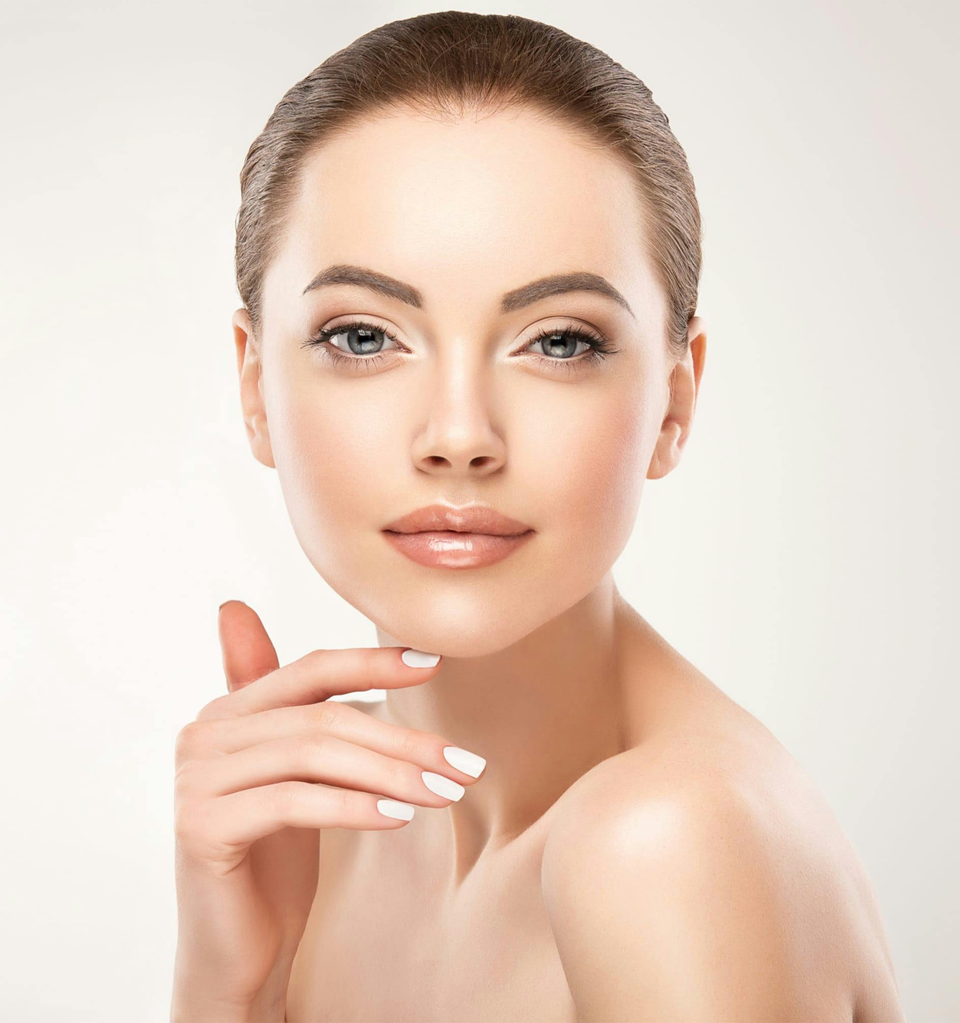 woman touching her chin