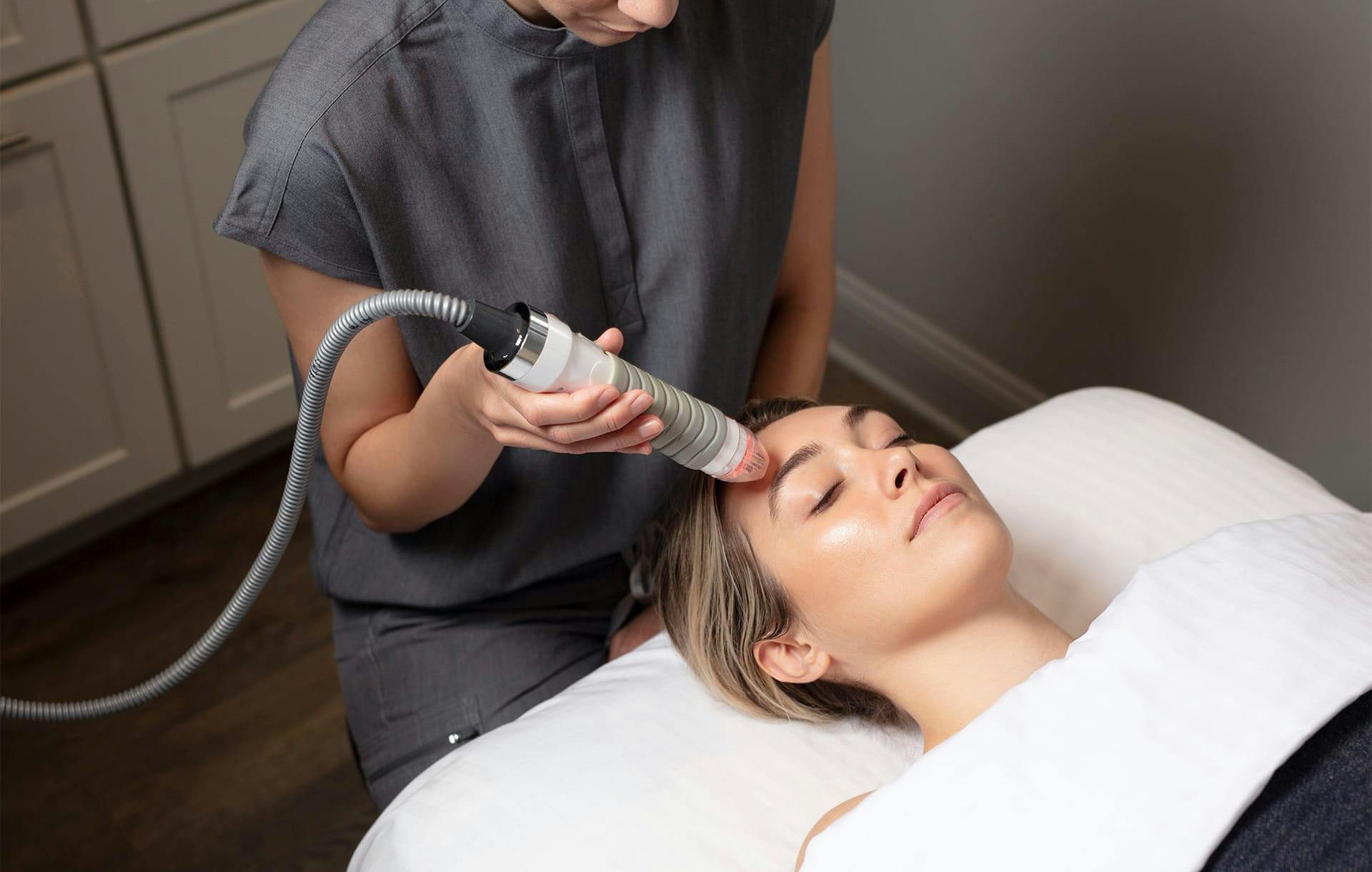 woman getting laser treatment