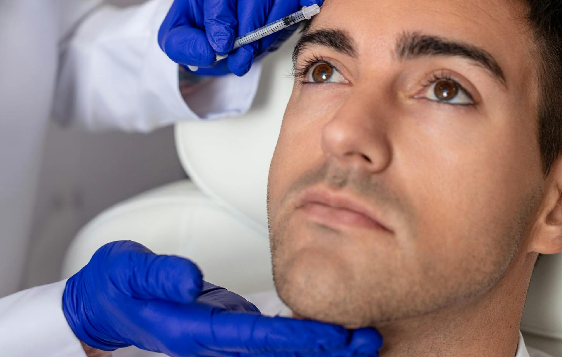 doctor touching patient's face