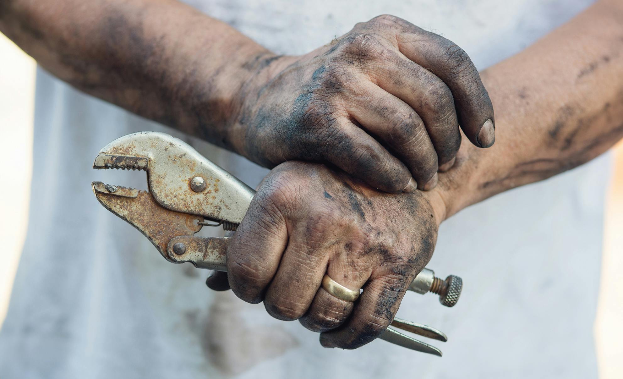 man touching wrist