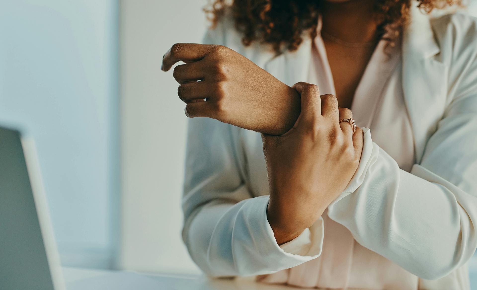 woman holding wrist