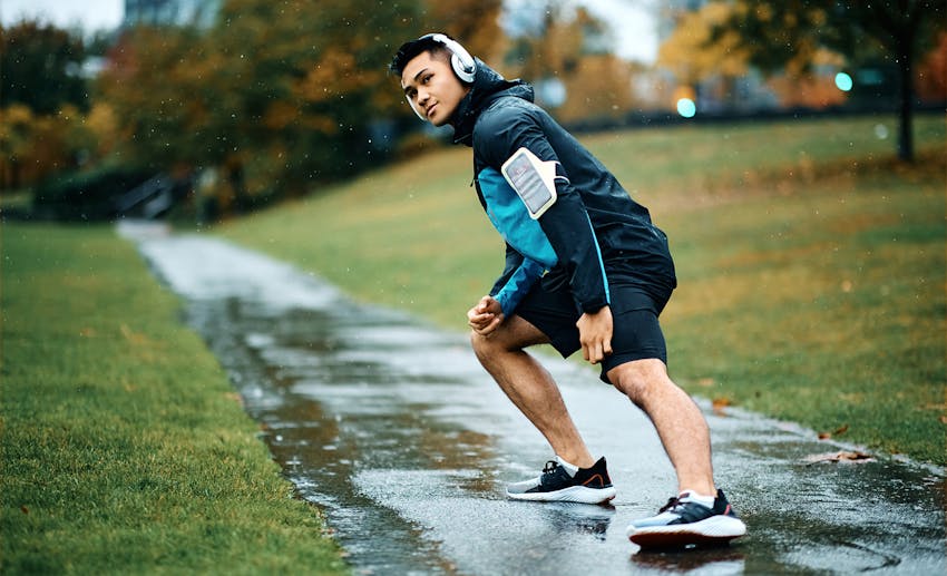 person stretching outside