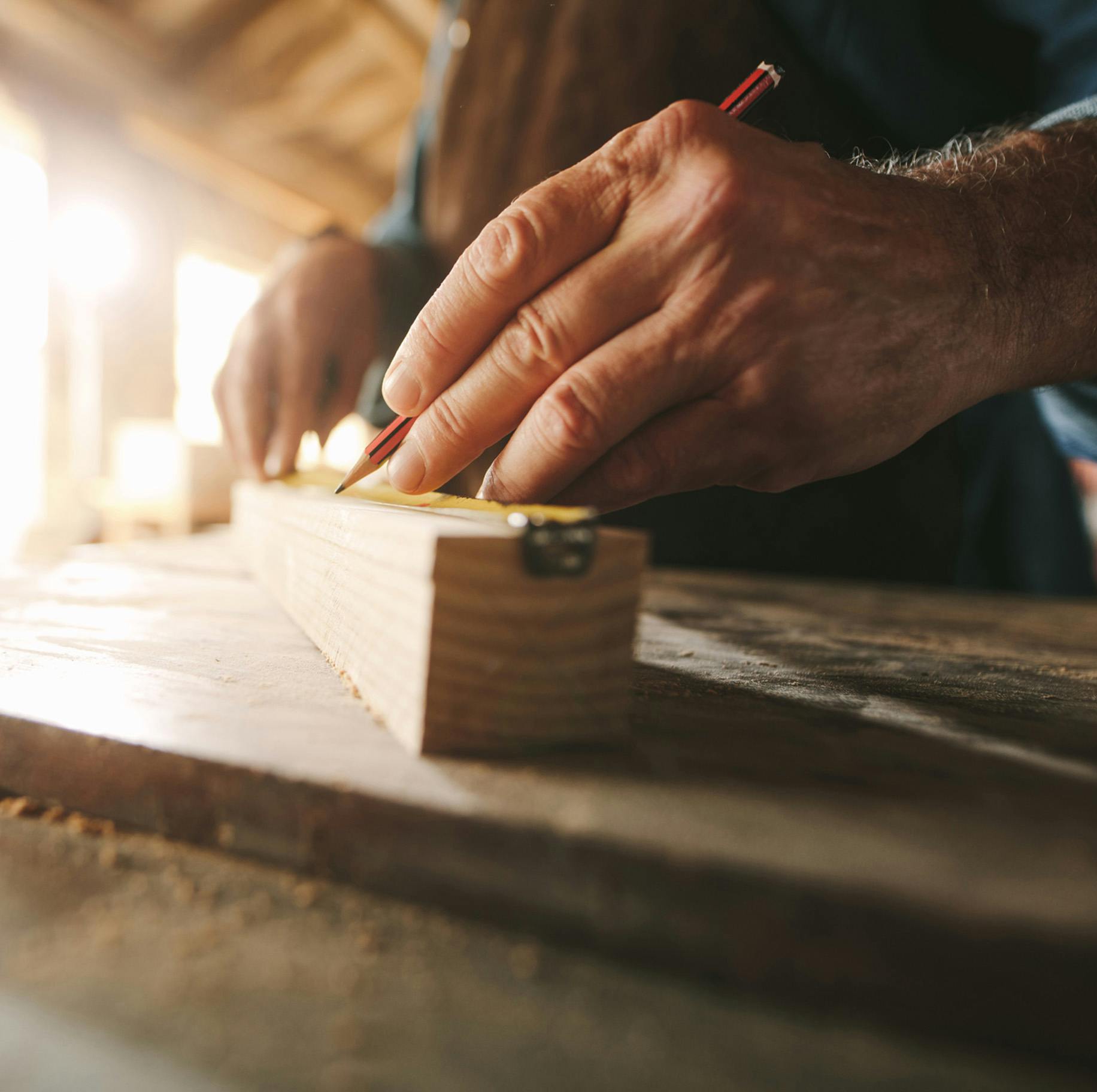 person holding pencil